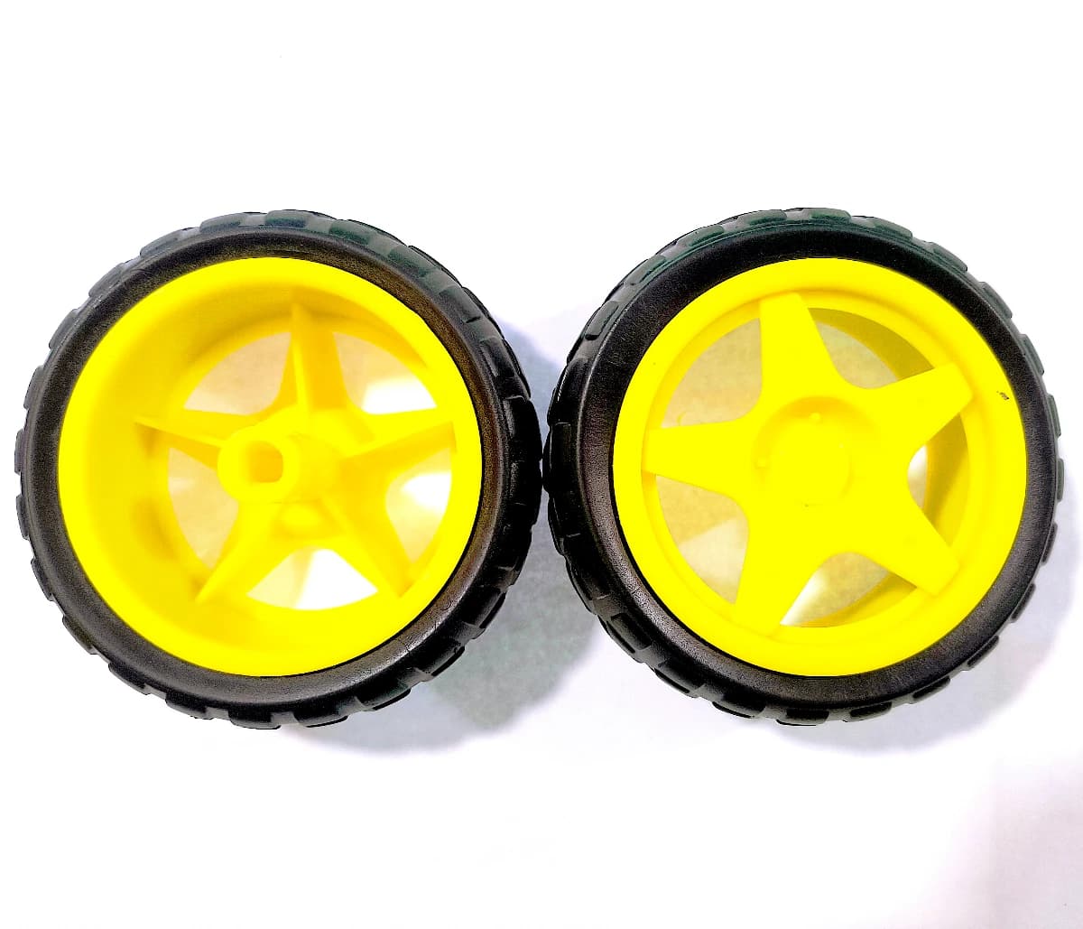 Imagen de Neumático Rueda de plástico Amarilla con Negro 65x25mm Arduino Proyector