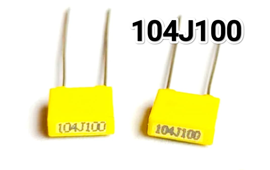 Imagen de Capacitor de Poliester Amarillo 104J100 (0 .1Mf/100V) (100Nf/100V) (Paquete de 10 uds)